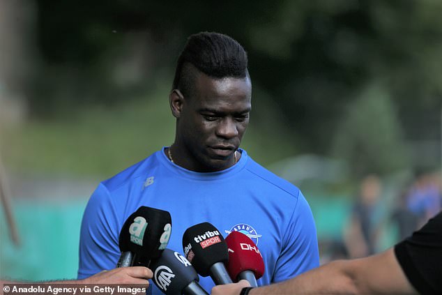 Ex-Man City star Mario Balotelli reveals new 'MB 459' face tattoo after adding to his growing collection that already includes the words 'black power' above the his eye, a cross on his cheek and a quote from Genghis Khan on his chest.