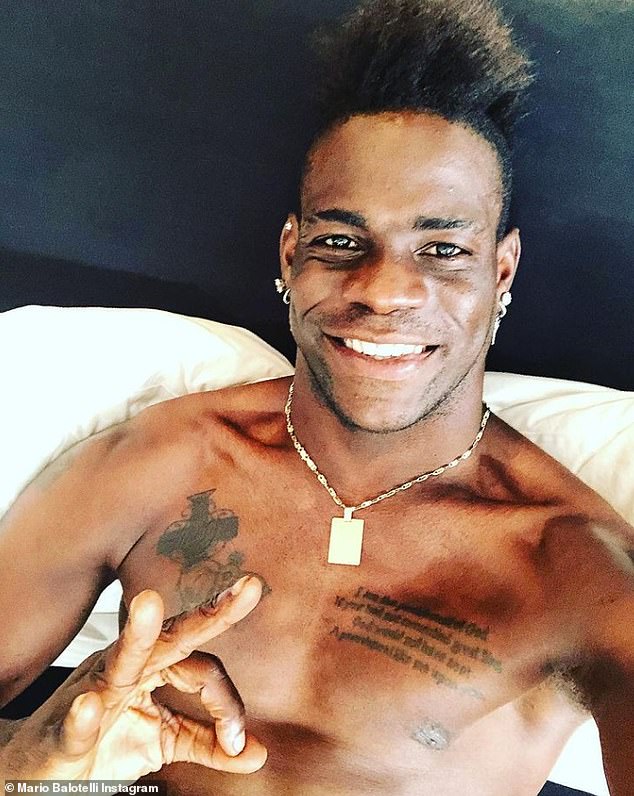Ex-Man City star Mario Balotelli reveals new 'MB 459' face tattoo after adding to his growing collection that already includes the words 'black power' above the his eye, a cross on his cheek and a quote from Genghis Khan on his chest.