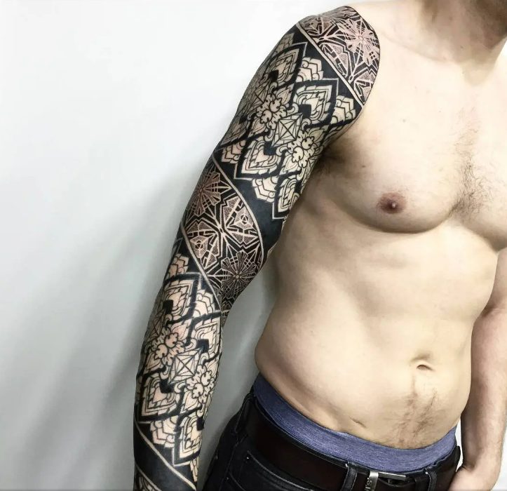 20 Striking Blackwork Tattoos For Both Men And Women.