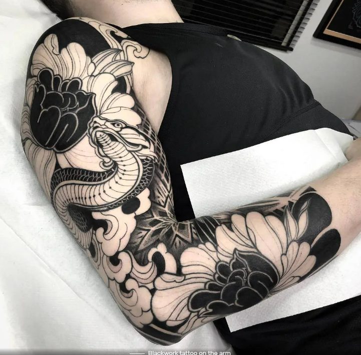 20 Striking Blackwork Tattoos For Both Men And Women.