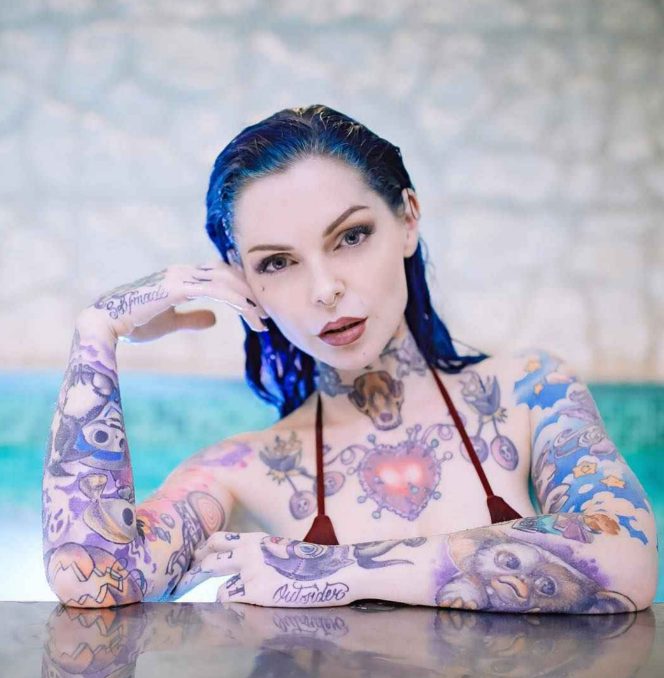 Celebrate The Beauty Of Body Art With Riae: The Talented Italian Tattoo Model Behind The Mesmerizing Photos.