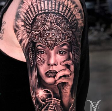 Exploring Yesy Tattoo'S Unique Approach To Black And Gray Tattooing Through Realistic Portraiture And Surrealism.