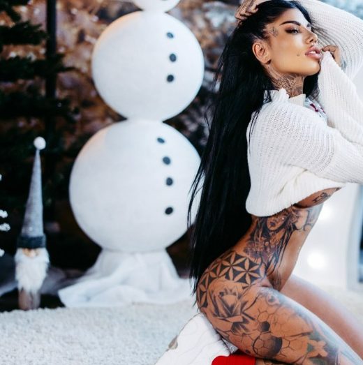 Revealing The Spellbinding Allure Of Inked Goddess Meli Lakic: A Visual Symphony Of Art And Beauty.