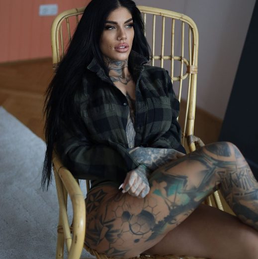 Revealing The Spellbinding Allure Of Inked Goddess Meli Lakic: A Visual Symphony Of Art And Beauty.