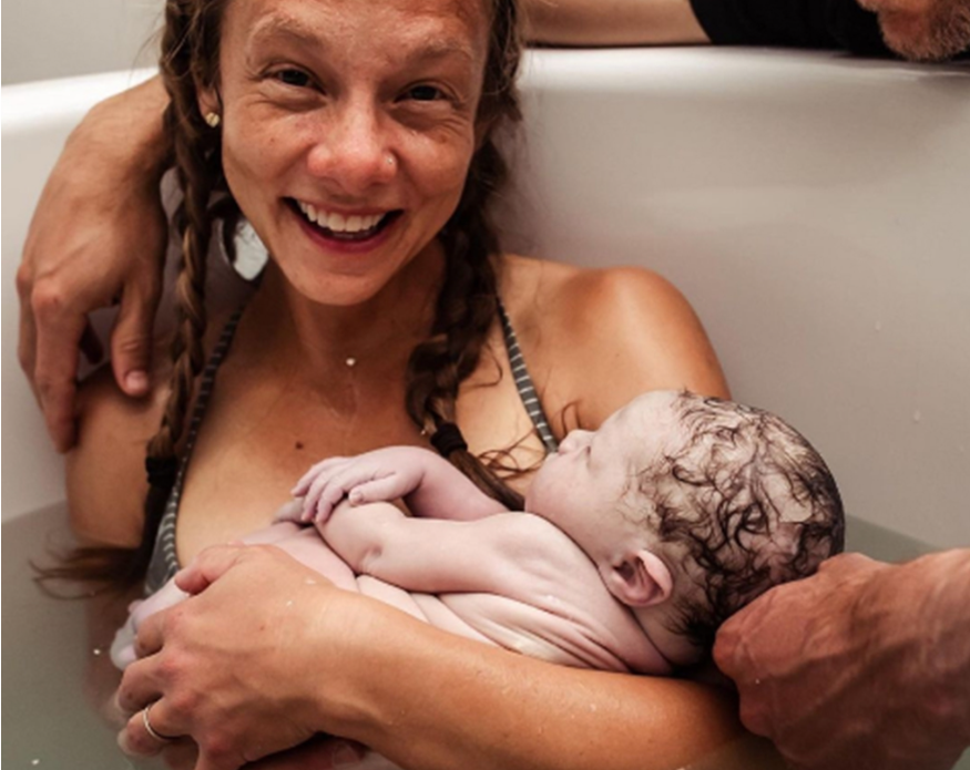 These photographs capture the most tender moments of the seventh child's birth.