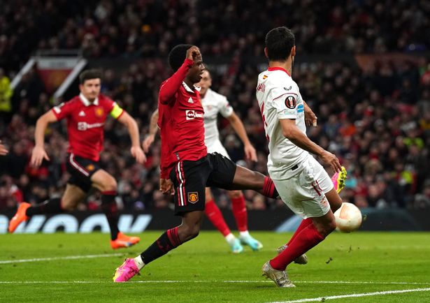 Manchester United's Tyrell Malacia scores an own goal,