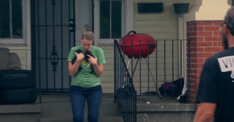 This injured motherdog runs down the street to look for her puppies