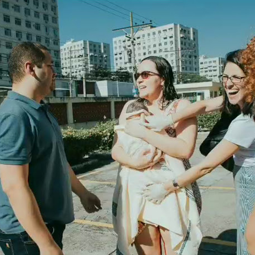 "Three uss Later, My Boy Was Born!" A Mother Discusses Delivery in the Parking Lot of Her Residence.