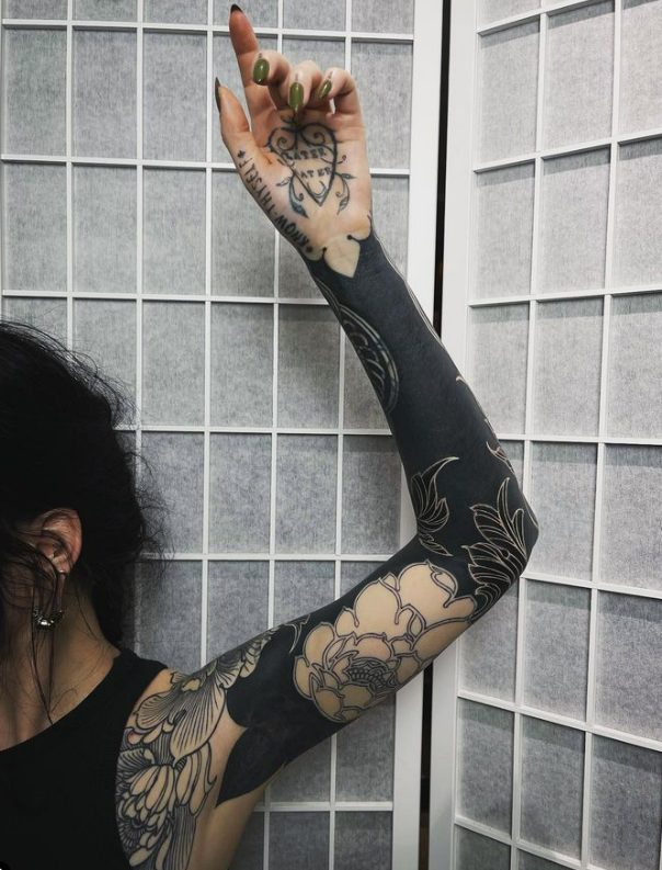 Unleashing The Creative Vision Of Tattoo Artist Kat Abdy: A Master Of Intricate And Imaginative Designs.