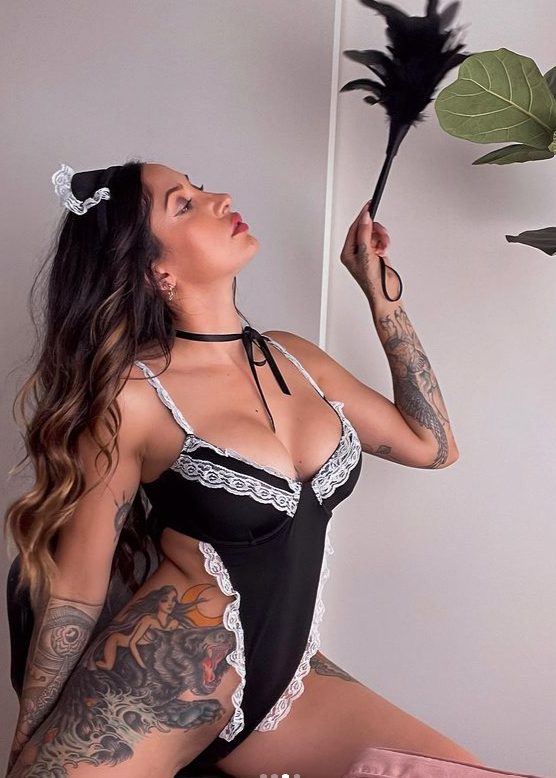 Beyond Traditional Beauty Standards: Celebrating The Personal Expression And Artistic Flair Of Misty Mason, The Tattooed Model And Advocate For Body Art.