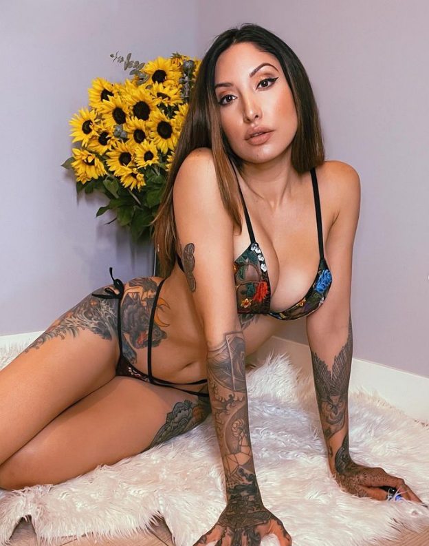 Beyond Traditional Beauty Standards: Celebrating The Personal Expression And Artistic Flair Of Misty Mason, The Tattooed Model And Advocate For Body Art.