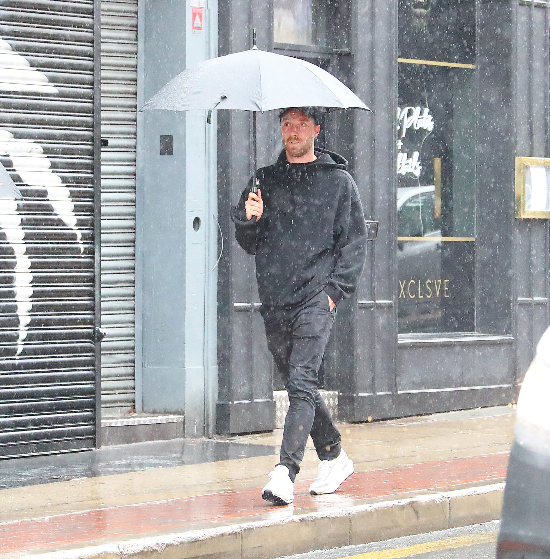 Christian Eriksen was spotted as a model walking the streets amid a romantic scene in Manchester