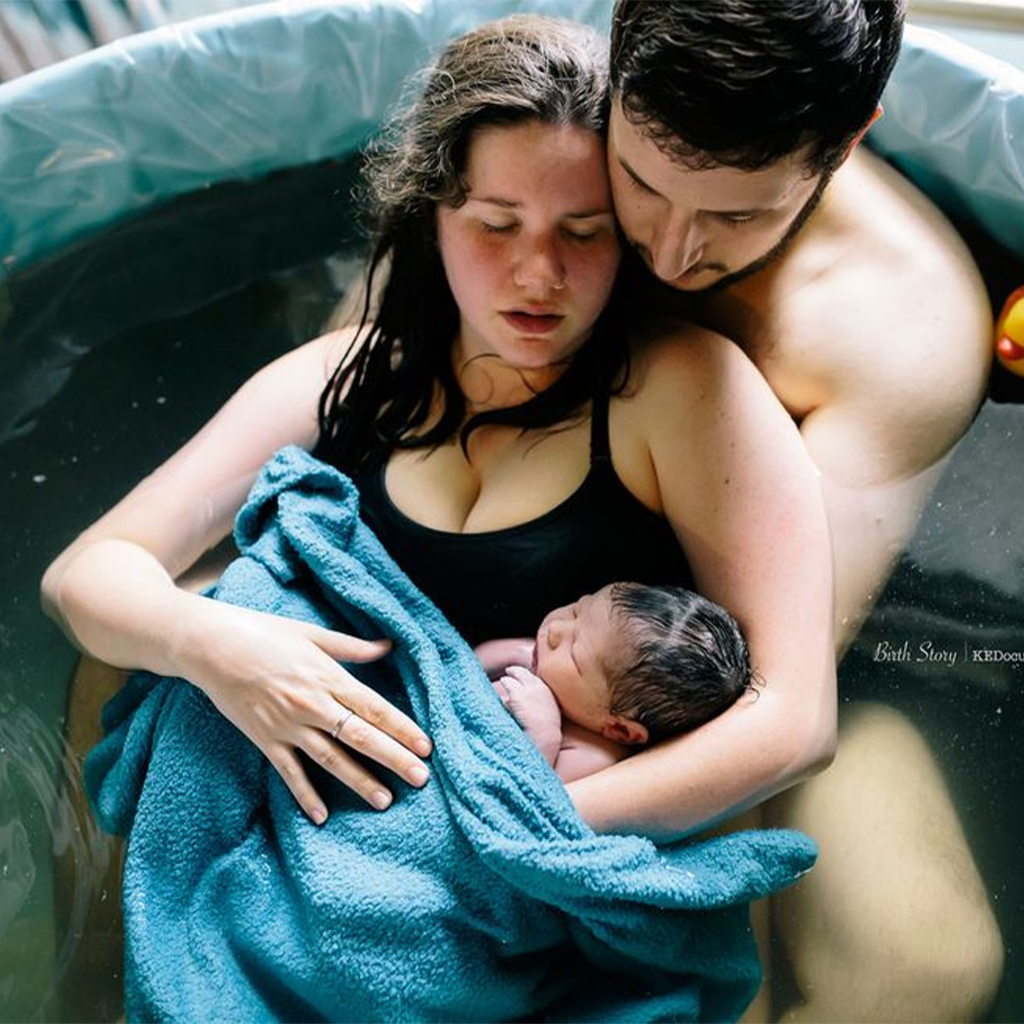 These twelve heart-wrenching photographs illustrate a real water birth.