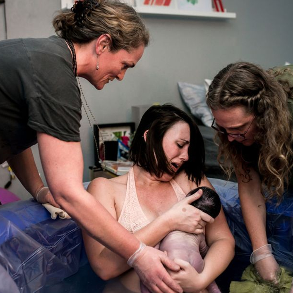 These twelve heart-wrenching photographs illustrate a real water birth.