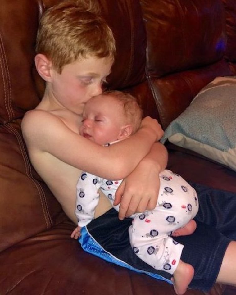 A 6-year-old brother hugged his premature infant in a touching moment