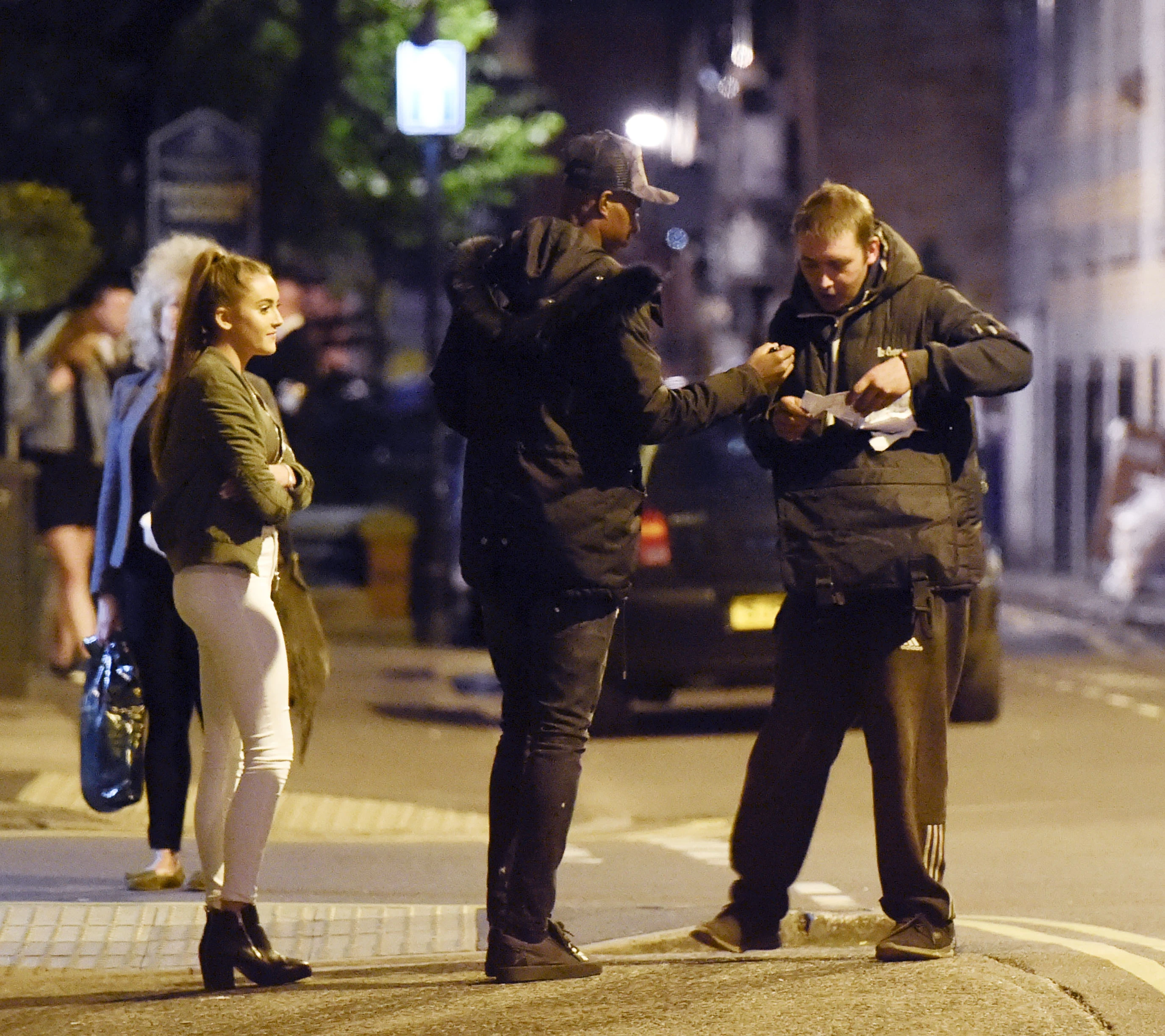 Young forward snapped on the way home from restaurant with brunette, even taking time to sign an autograph for a fan