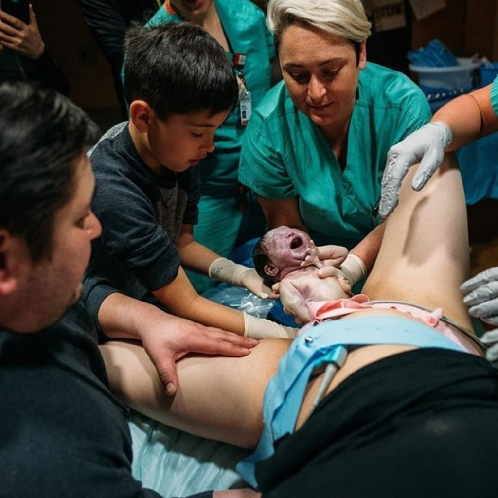 These Heartwarming Photos Show a 9-Year-Old Boy Supporting His Mum During Childbirth