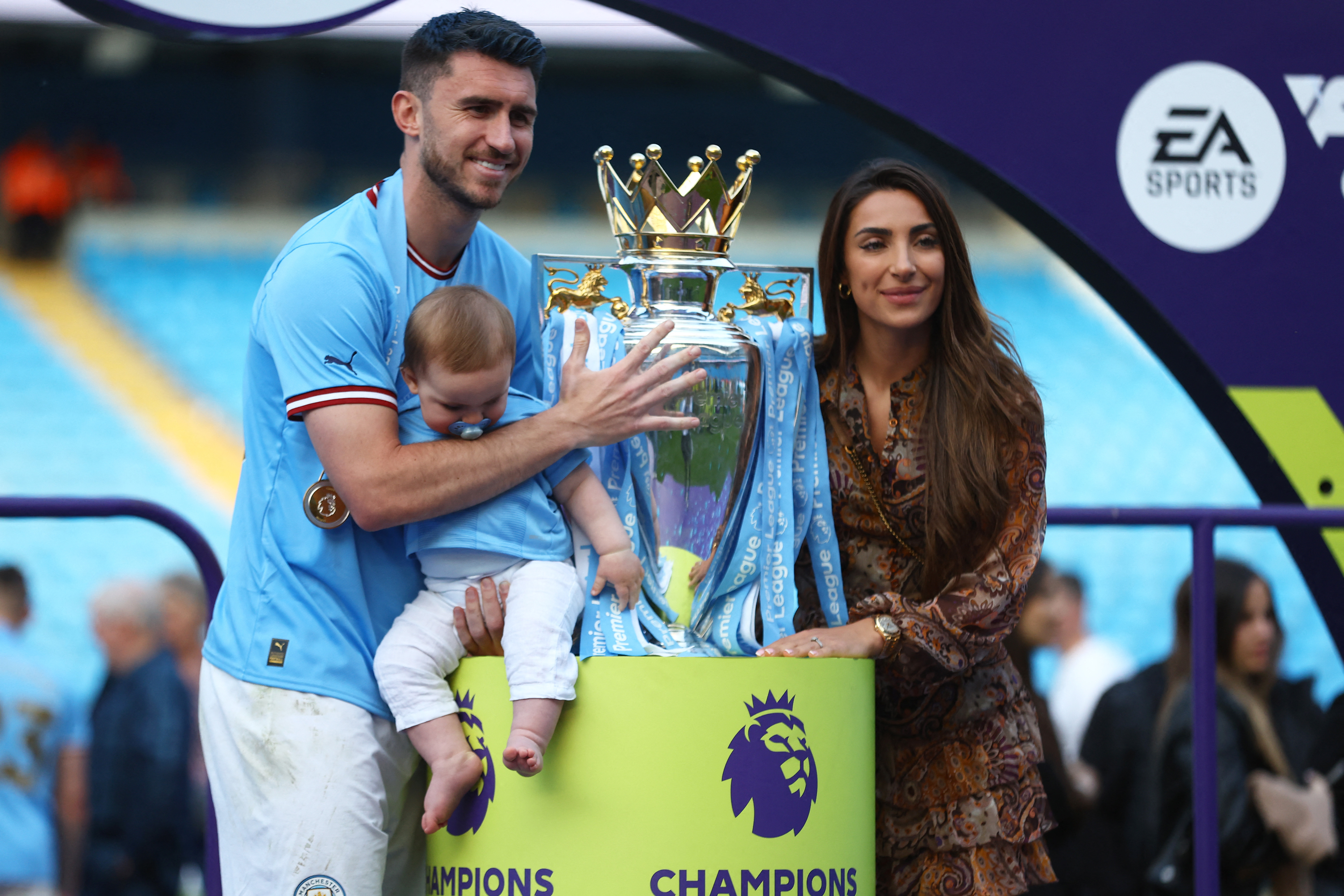 Aymeric Laporte, Wag Sara Botello and their son Lucay pose for the cameras