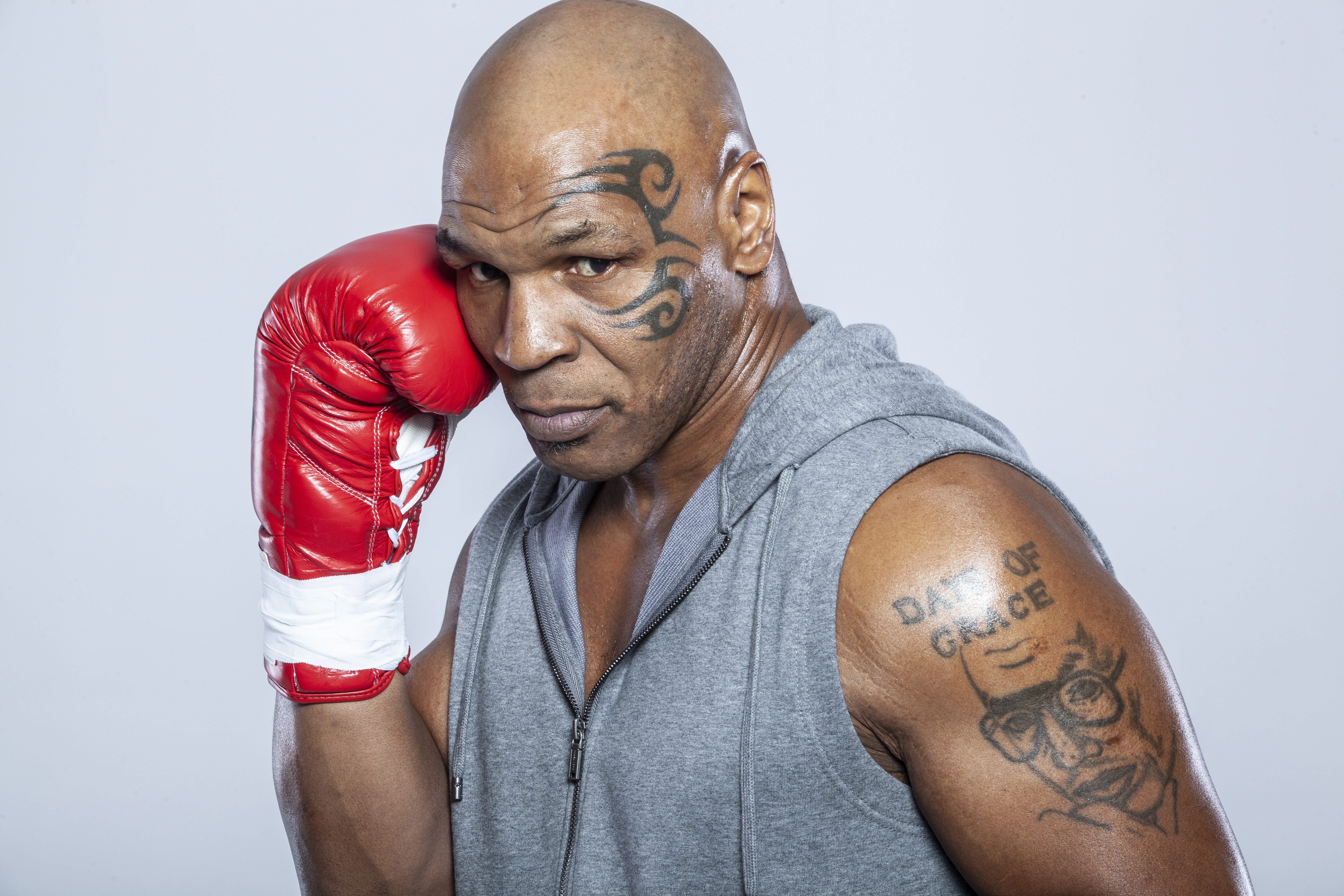 Mike Tyson's face tattoo and other designs meaning from communist heads to former tennis champ and ex-wife he cheated on – The US Sun | The US Sun