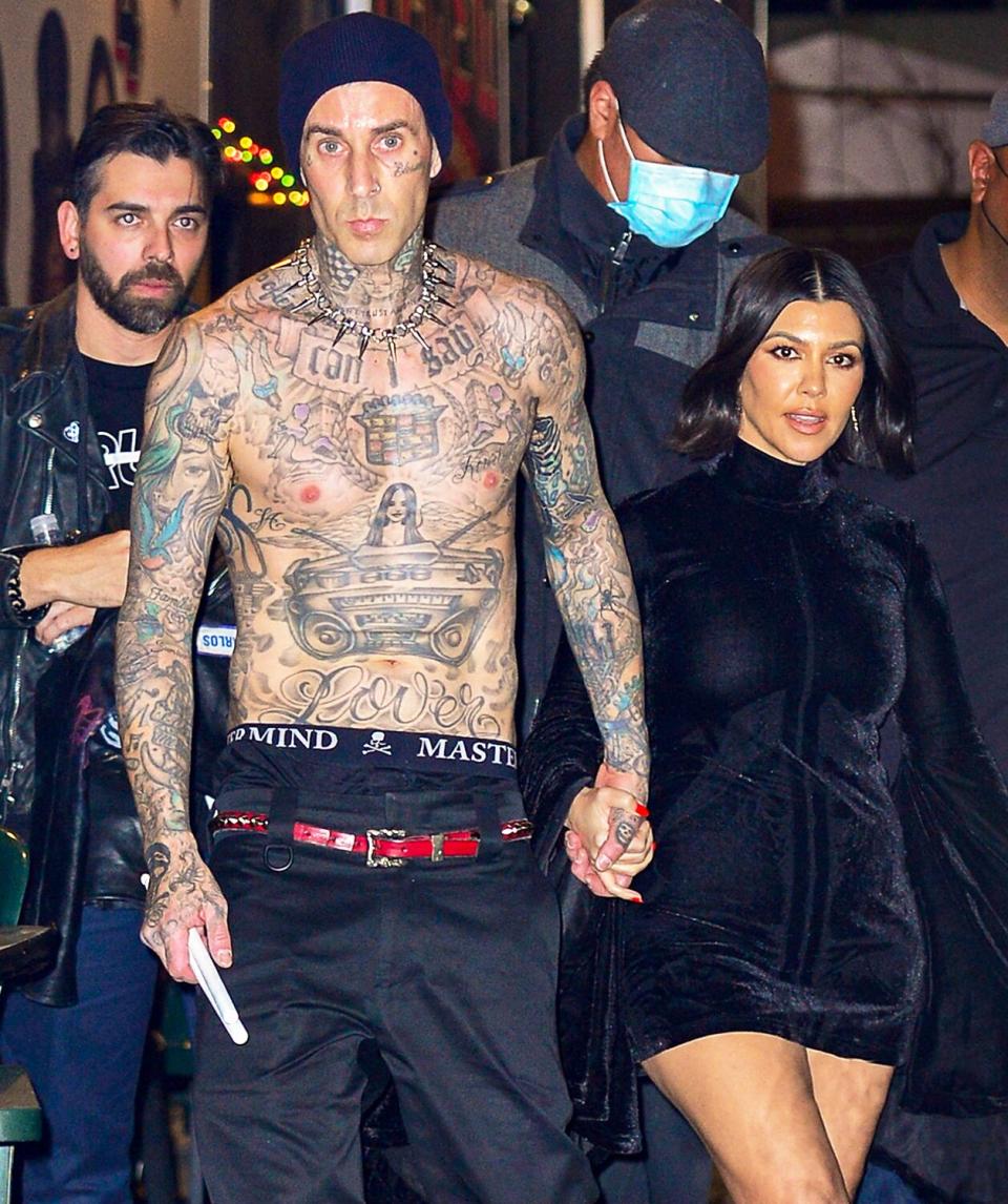 Kourtney Kardashian Holds Hands with Shirtless Fiancé Travis Barker After Avril Lavigne Concert