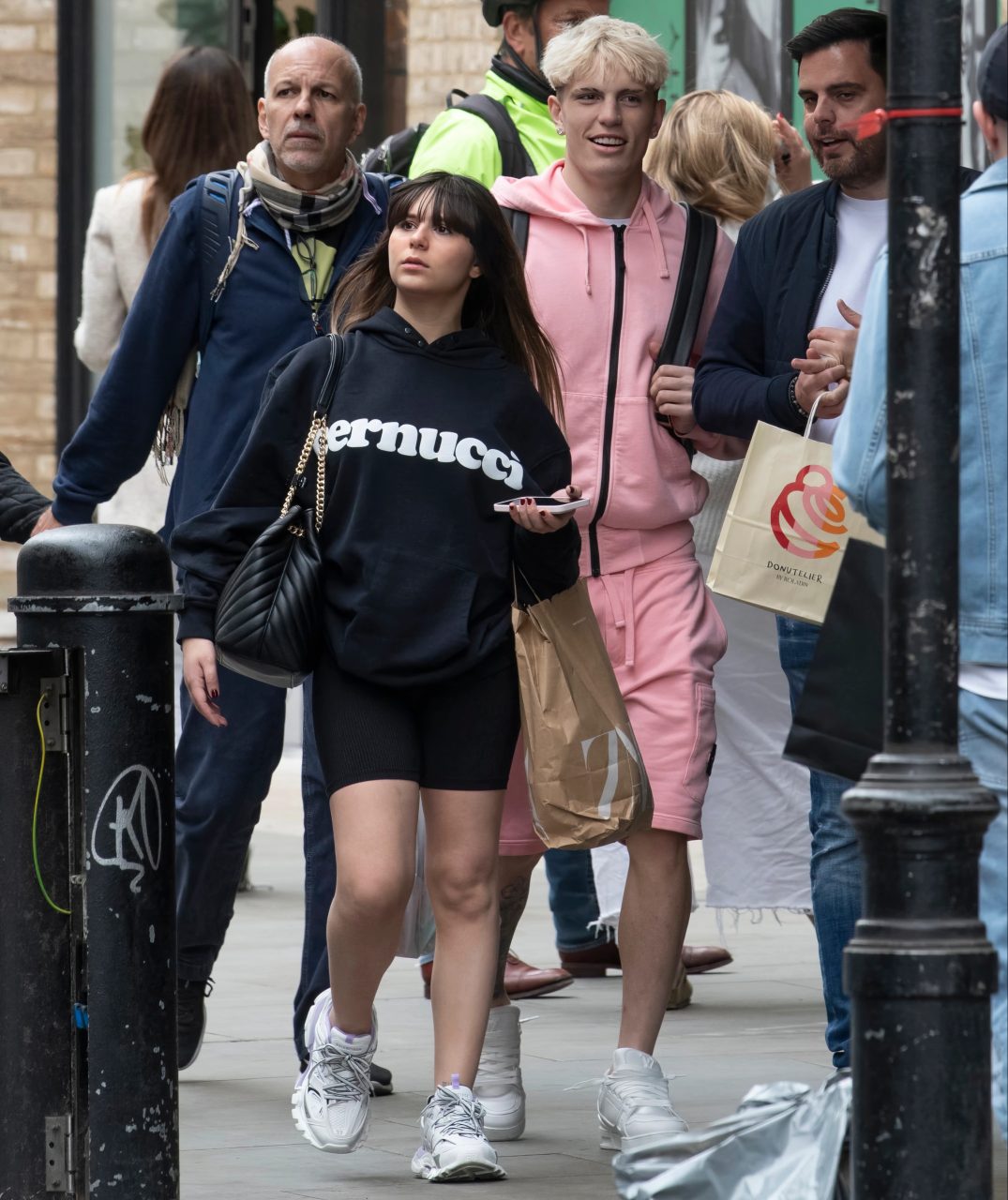 Man Utd star, Garnacho holding "weird item" while shopping with his pregnant girlfriend in pink tracksuit