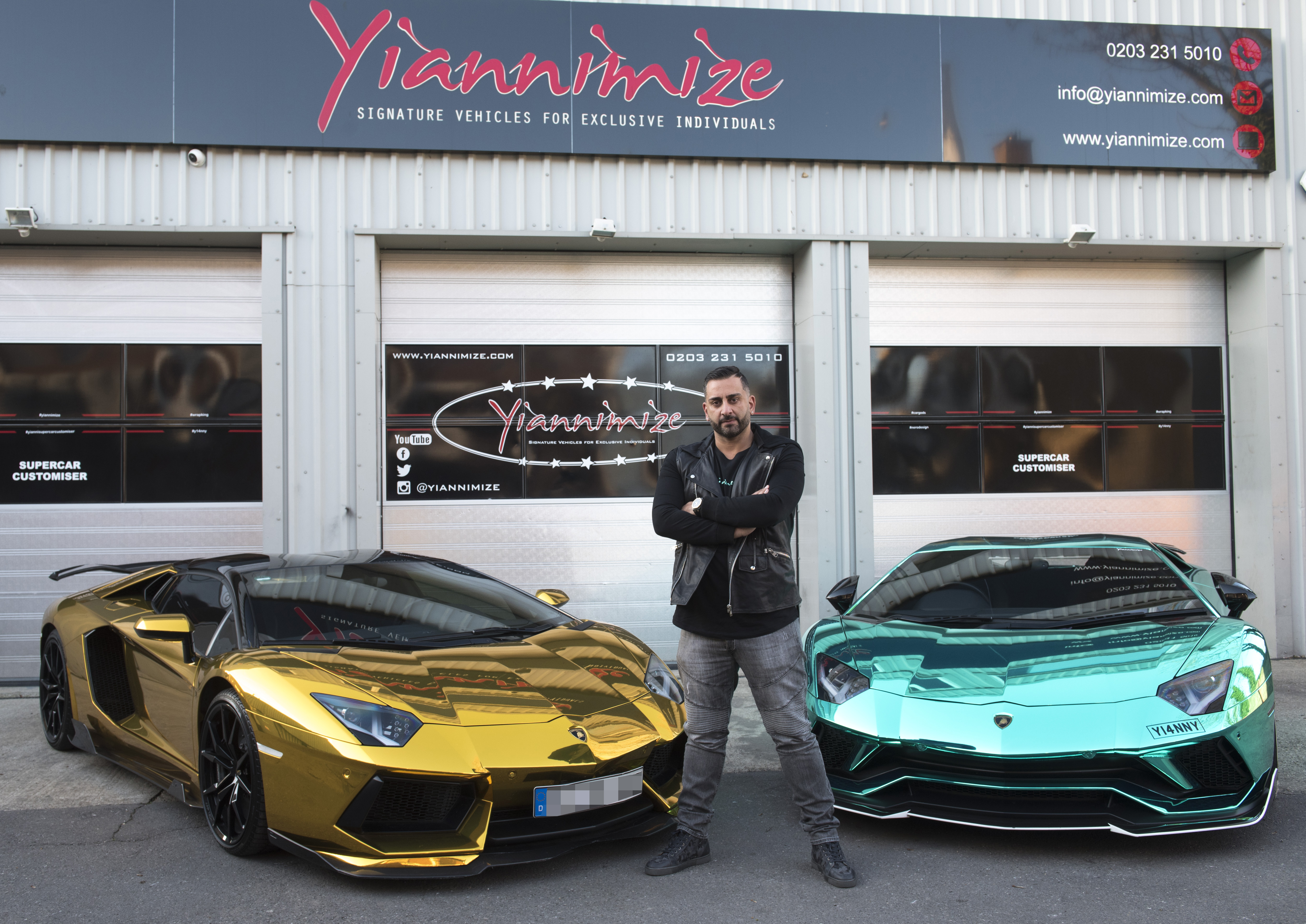  Car customiser Yianni Charalambous stands next to Aubameyang's gold wrapped Lamborghini