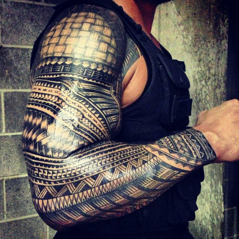 Roman Reigns 2 Tattoos Their Meaning Body Art Guru