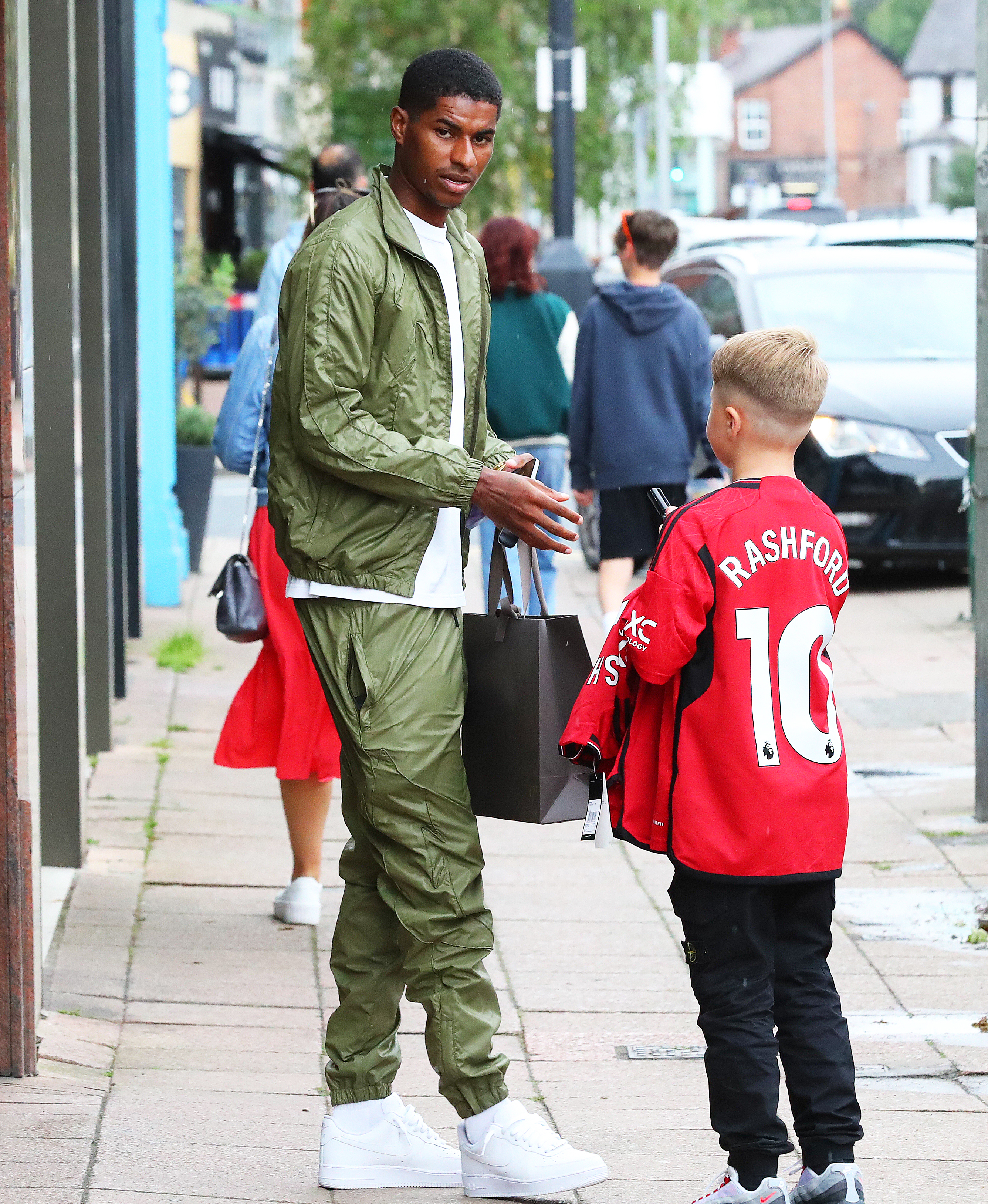 Man Utd’s Marcus Rashford left his brand new £700k Rolls Royce on double yellows while signing the shirt of a young fan outside a Cheshire jewellers, on Saturday evening