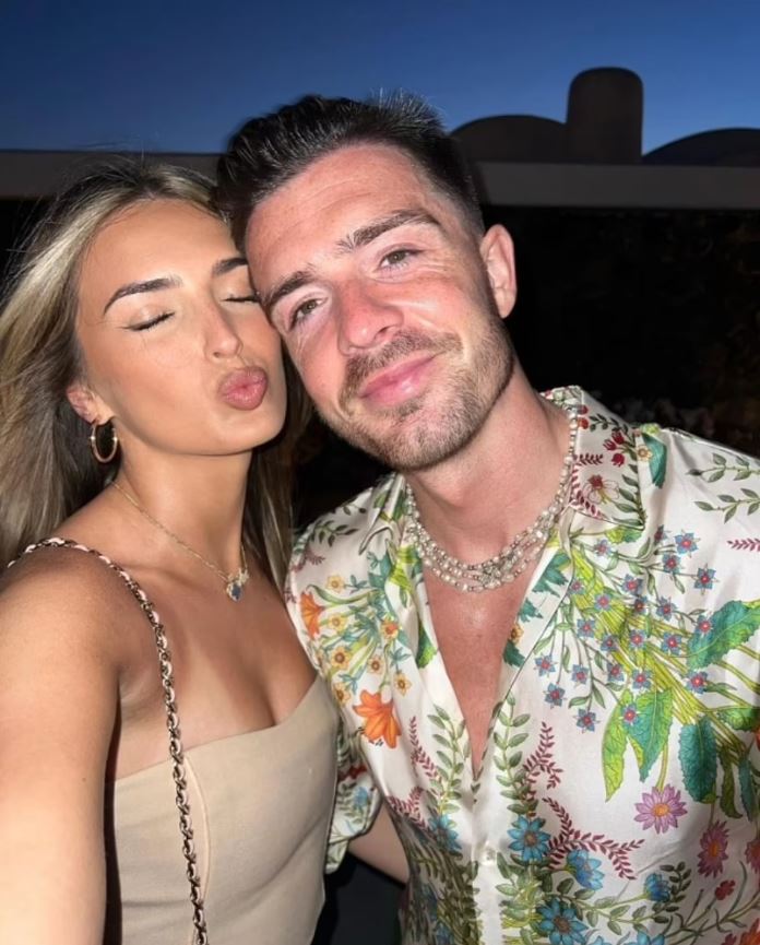 Jack Grealish, pictured with girlfriend Sasha Attwood, has been all over the world in party mood after a treble- winning season