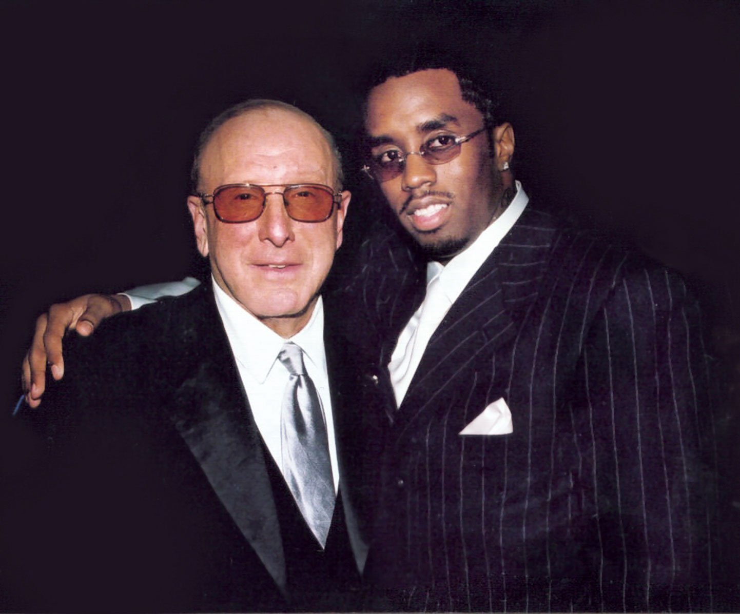 Clive Davis with Puffy at the Pre-Grammy Gala, 2002 - Official_photo - Clive  Davis